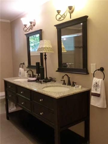 404 Golfview Lane Springfield, TN 37172 - Photo 9 of 20 Master bathroom features tile flooring, new double-sink vanity