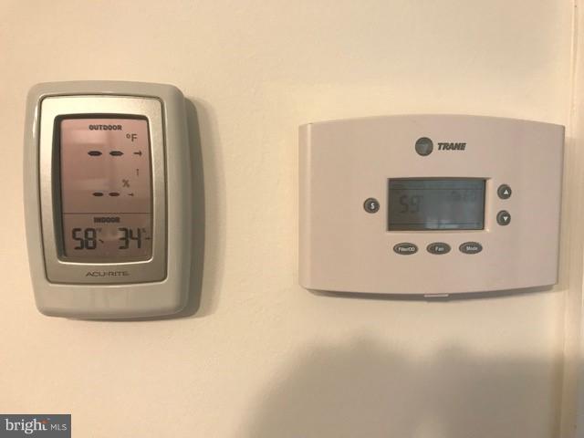 15690 Oakland Road Reva, VA 22735 - Photo 64 of 74 crawl space climate control/monitor and thermostat