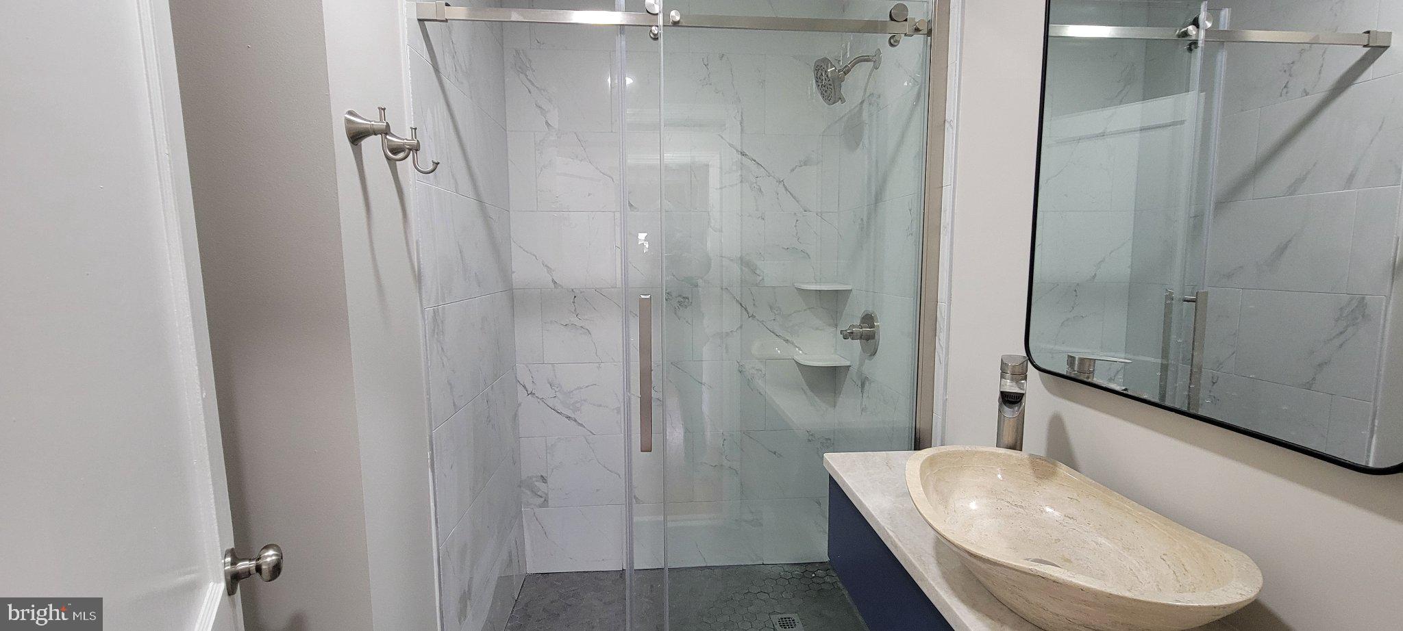 102 Rothwell Drive Wilmington, DE 19804 - Photo 14 of 52 Sleek modern bathroom with elegance.