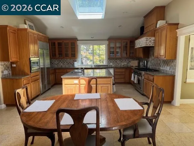 a view of a dining room with furniture