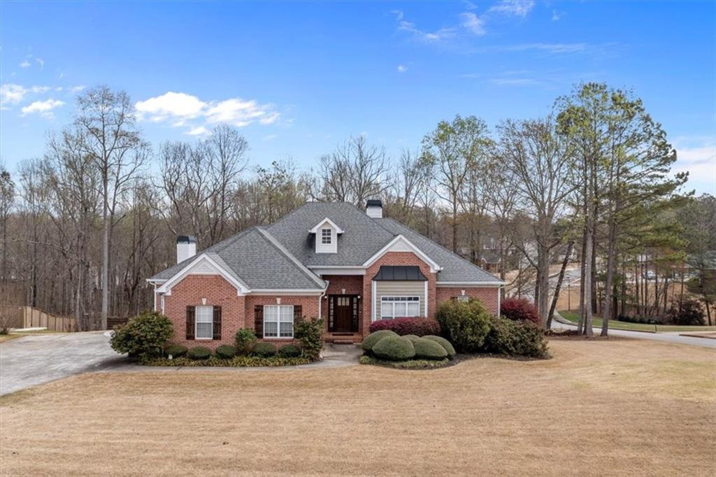 6972 Diamond Court Winston, GA 30187 - Photo 1 of 1 a front view of a house with a yard