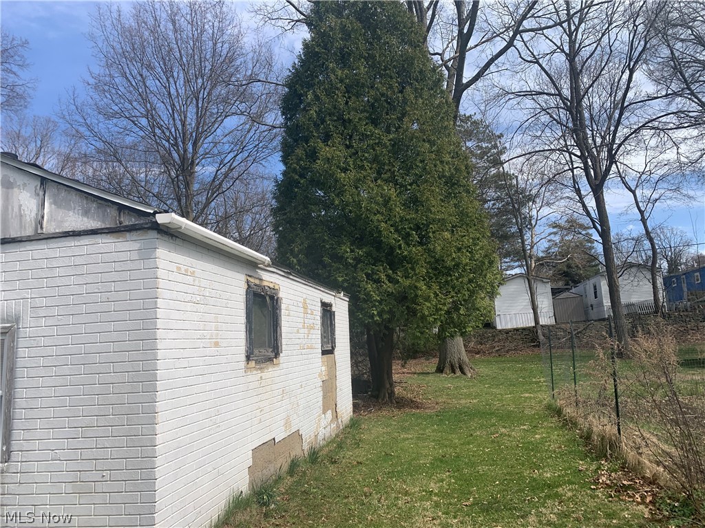 3605 Franklin Road Stow, OH 44224 - Photo 4 of 14 View of side of property with a yard