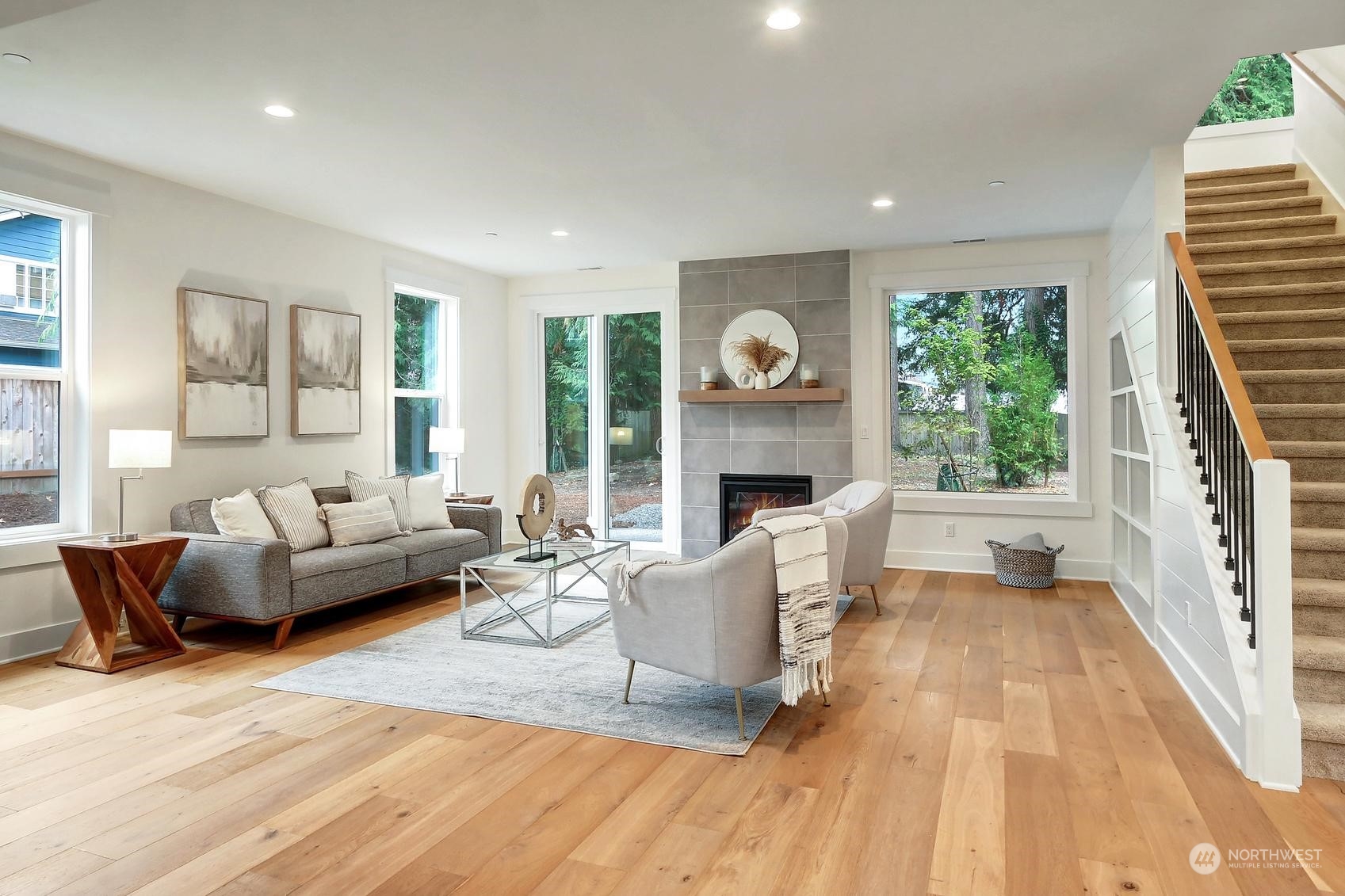 7922 203rd Street Southwest Edmonds, WA 98026 - Photo 12 of 33 a living room with fireplace furniture and a large window
