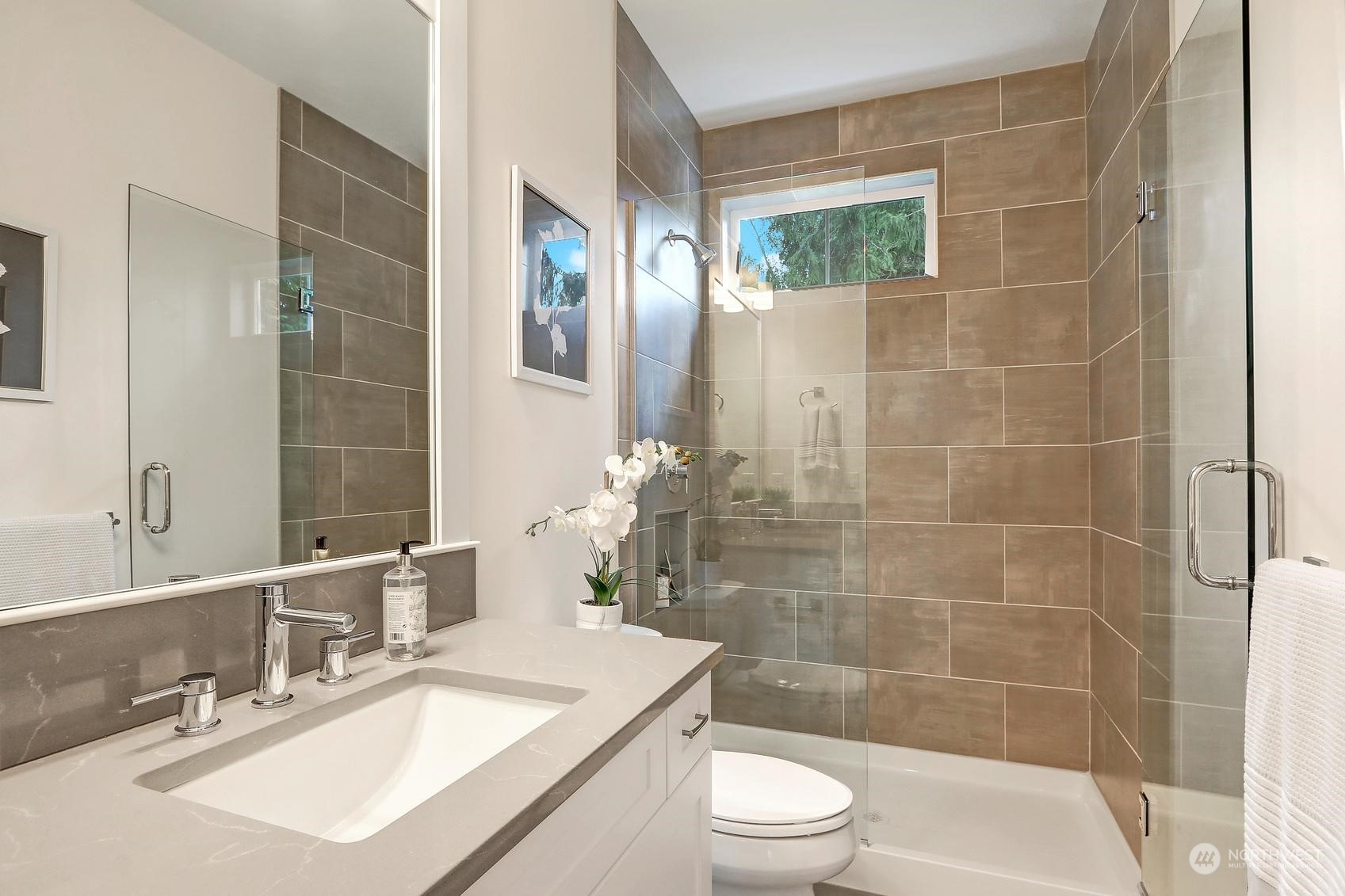 7922 203rd Street Southwest Edmonds, WA 98026 - Photo 13 of 33 a bathroom with a sink a toilet and shower