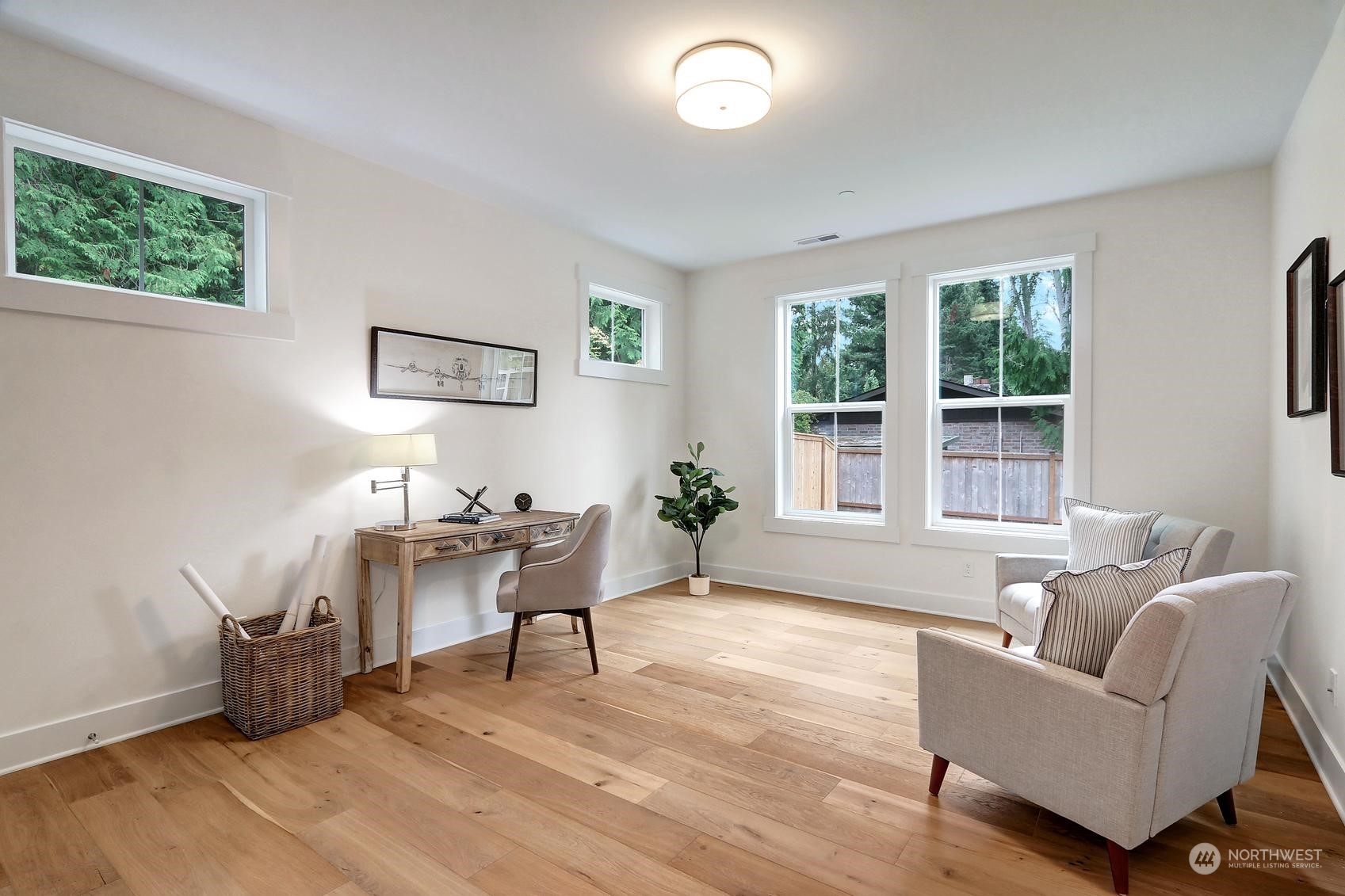 7922 203rd Street Southwest Edmonds, WA 98026 - Photo 14 of 33 a living room with furniture and a large window