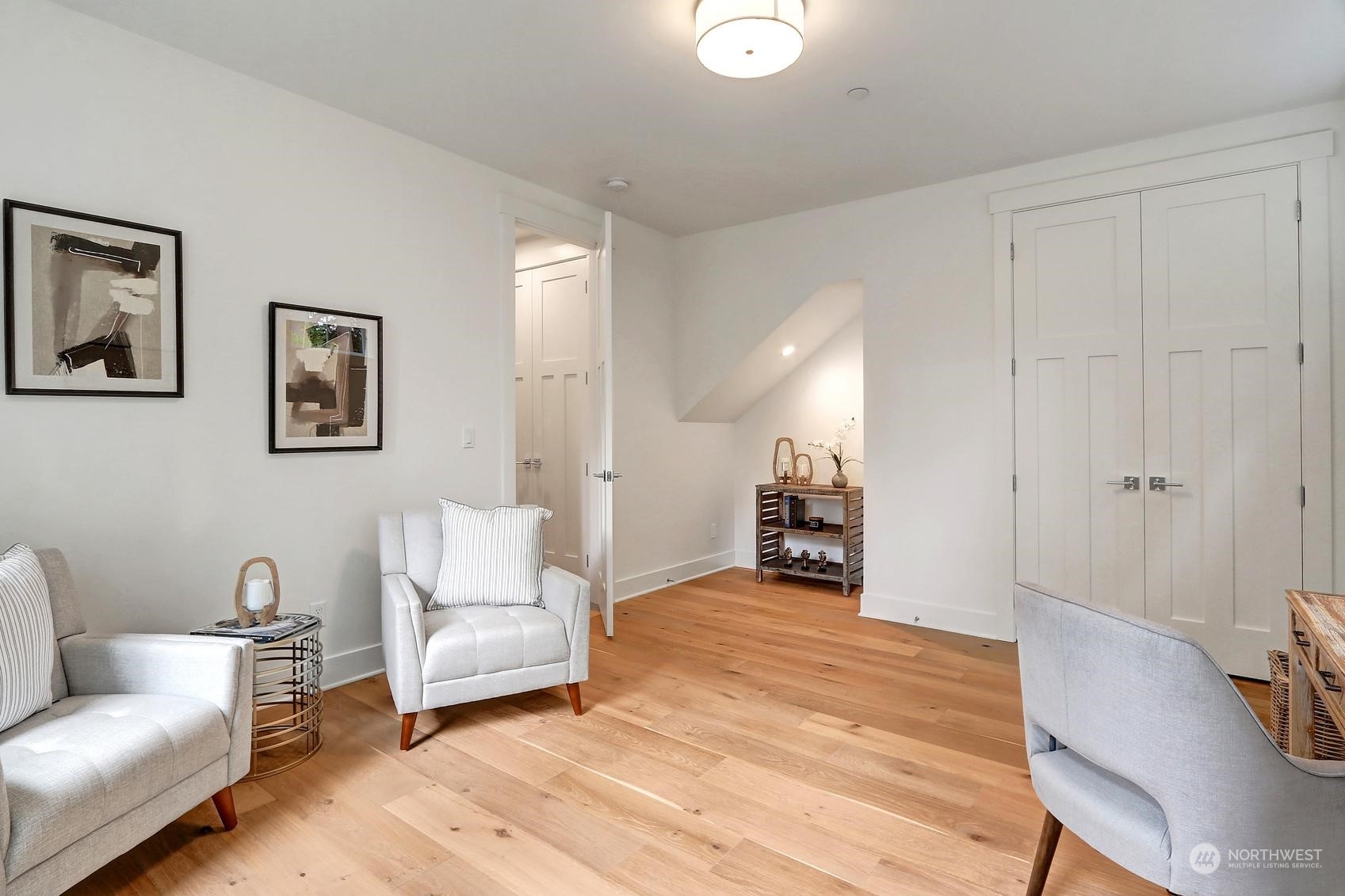 7922 203rd Street Southwest Edmonds, WA 98026 - Photo 15 of 33 a living room with furniture and a wooden floor