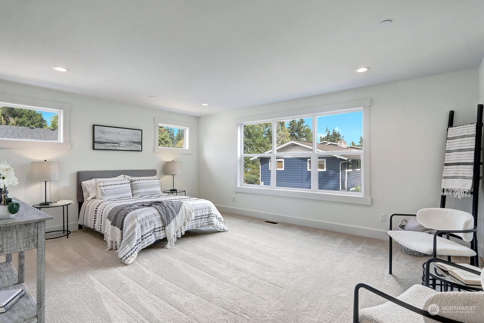 7922 203rd Street Southwest Edmonds, WA 98026 - Photo 17 of 33 a bed room with a bed furniture and a window
