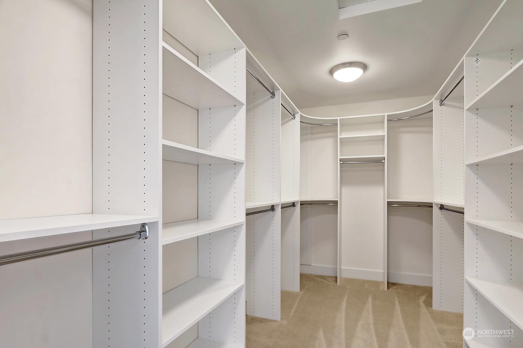 7922 203rd Street Southwest Edmonds, WA 98026 - Photo 21 of 33 a view of walk in closet with empty racks