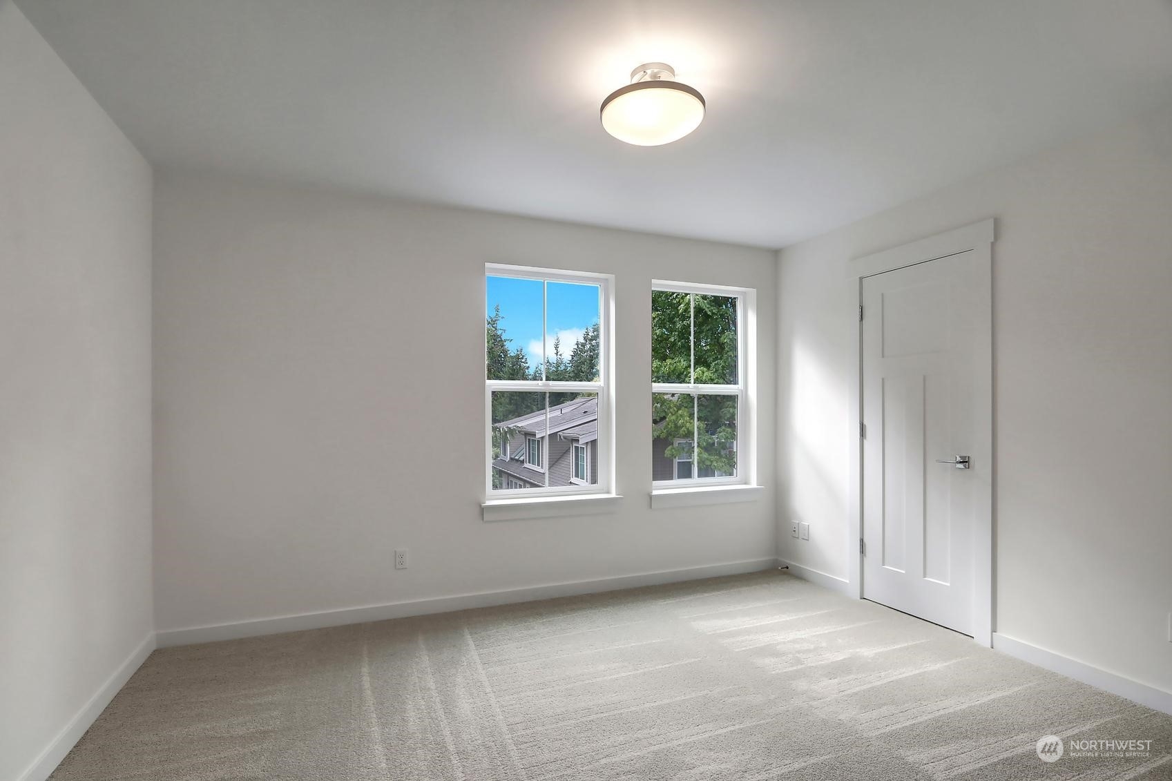 7922 203rd Street Southwest Edmonds, WA 98026 - Photo 23 of 33 an empty room with a window