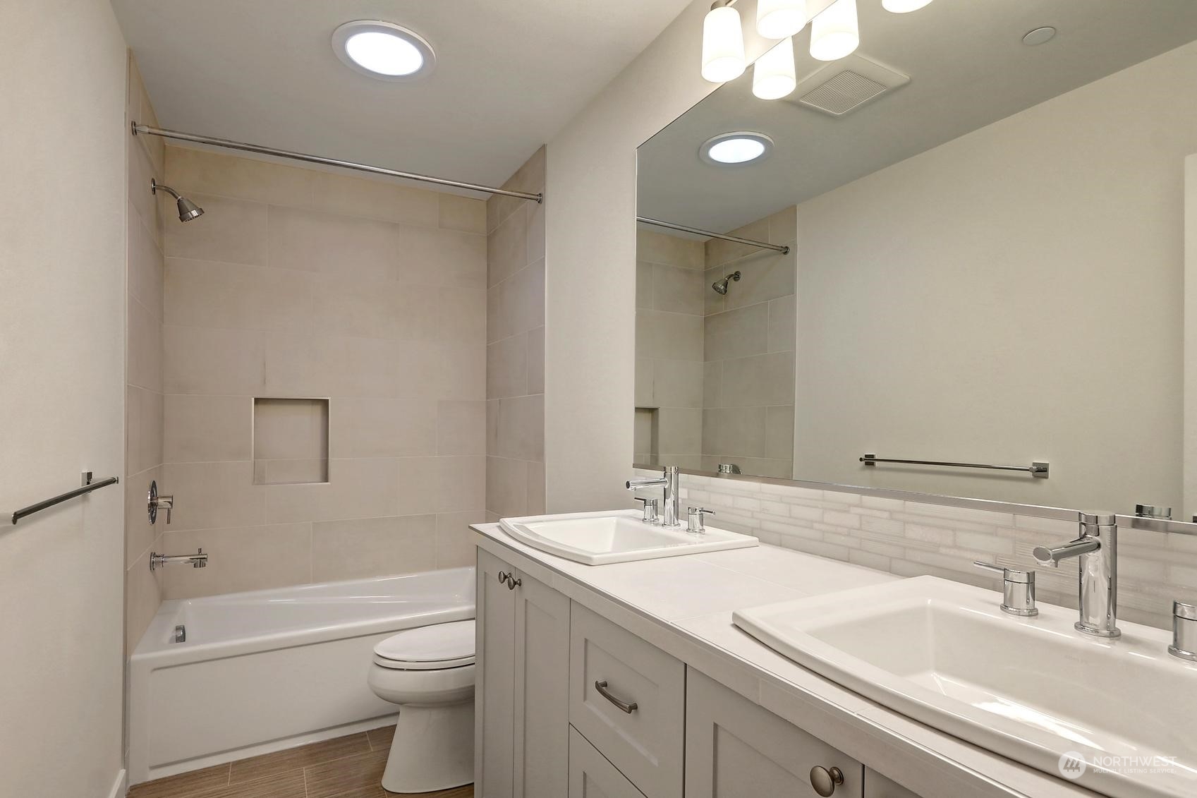 7922 203rd Street Southwest Edmonds, WA 98026 - Photo 25 of 33 a bathroom with a sink a toilet and shower