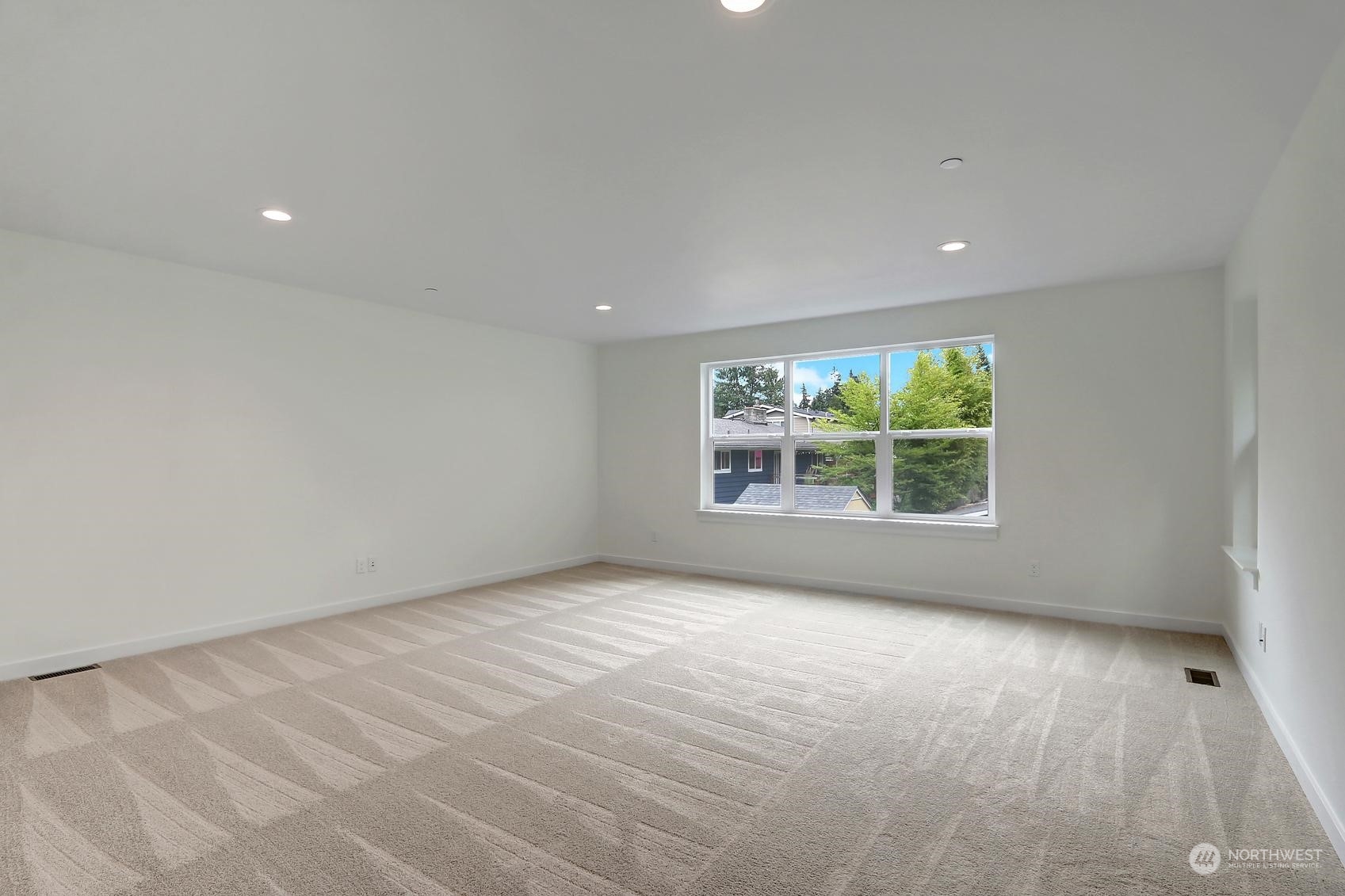 7922 203rd Street Southwest Edmonds, WA 98026 - Photo 27 of 33 an empty room with windows