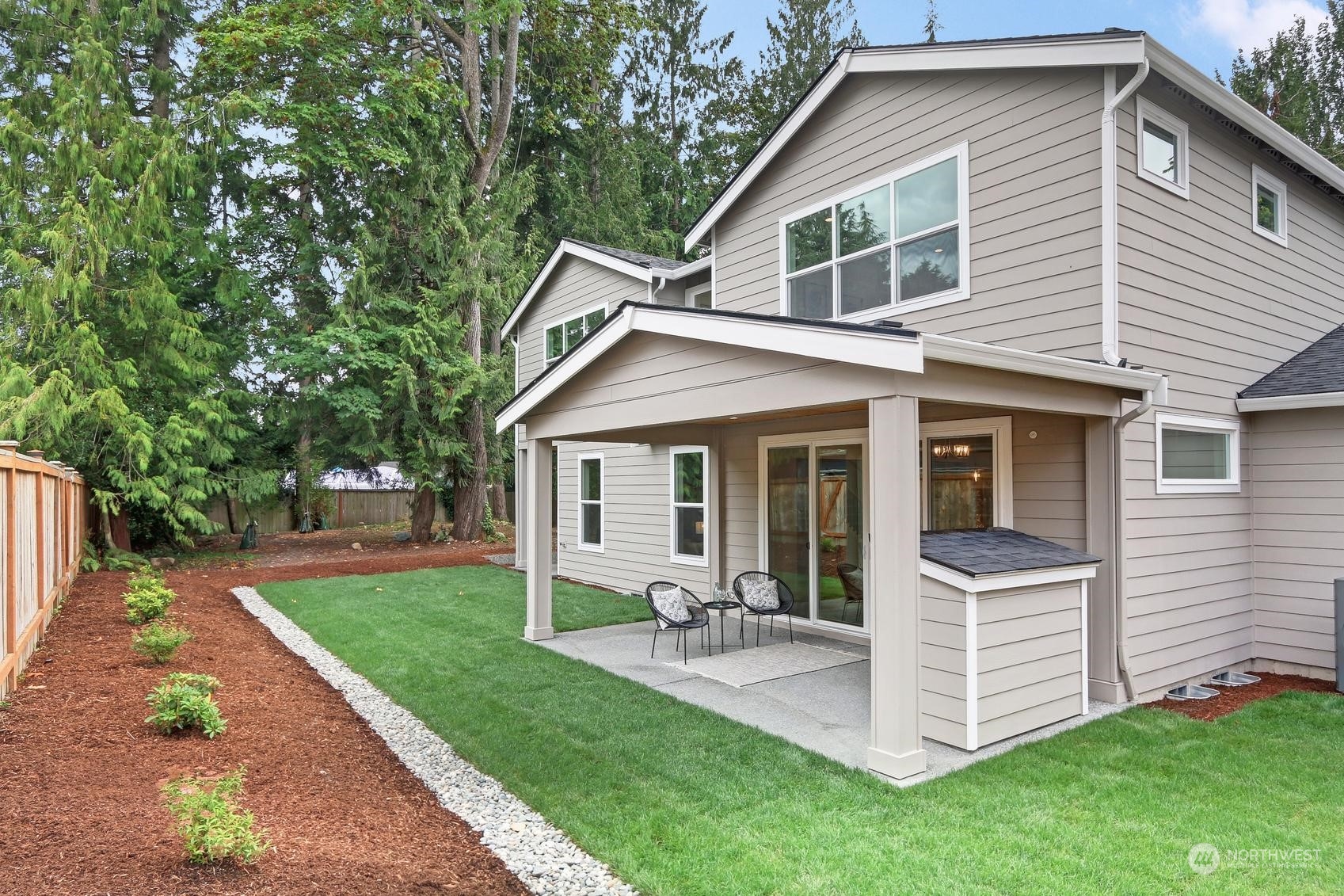 7922 203rd Street Southwest Edmonds, WA 98026 - Photo 30 of 33 a view of a house with a yard and sitting area