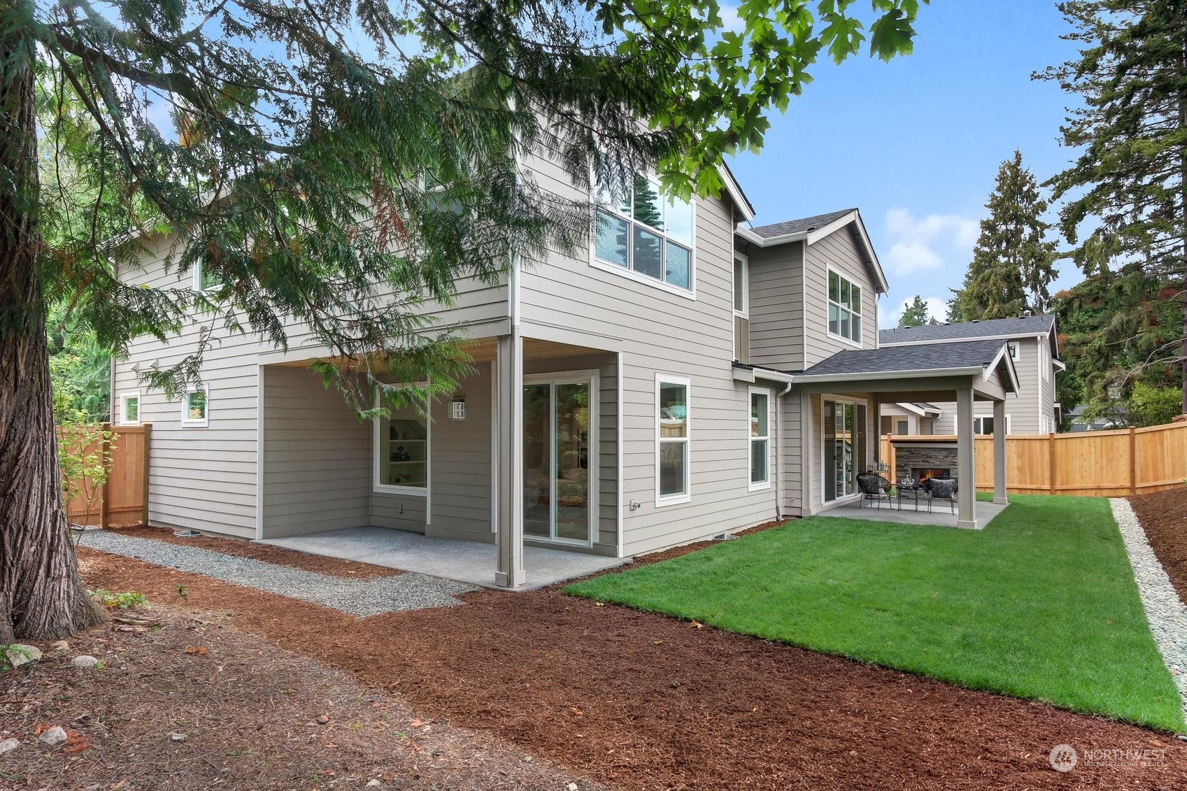 7922 203rd Street Southwest Edmonds, WA 98026 - Photo 31 of 33 a view of a house with a yard and large tree