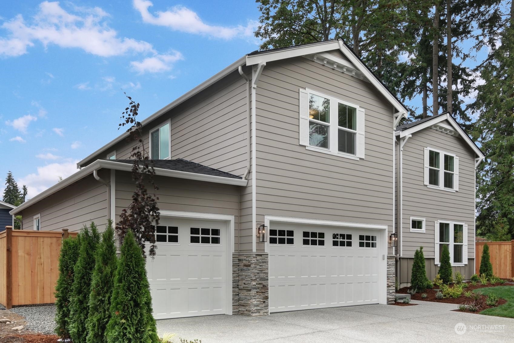 7922 203rd Street Southwest Edmonds, WA 98026 - Photo 32 of 33 a front view of a house with a yard