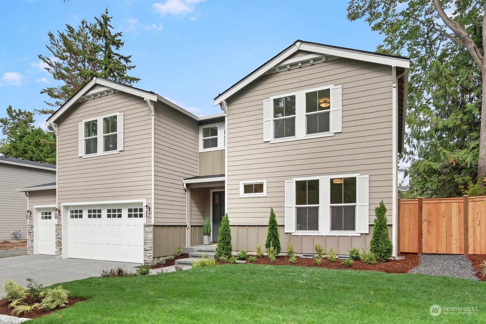 7922 203rd Street Southwest Edmonds, WA 98026 - Photo 33 of 33 a front view of a house with a yard