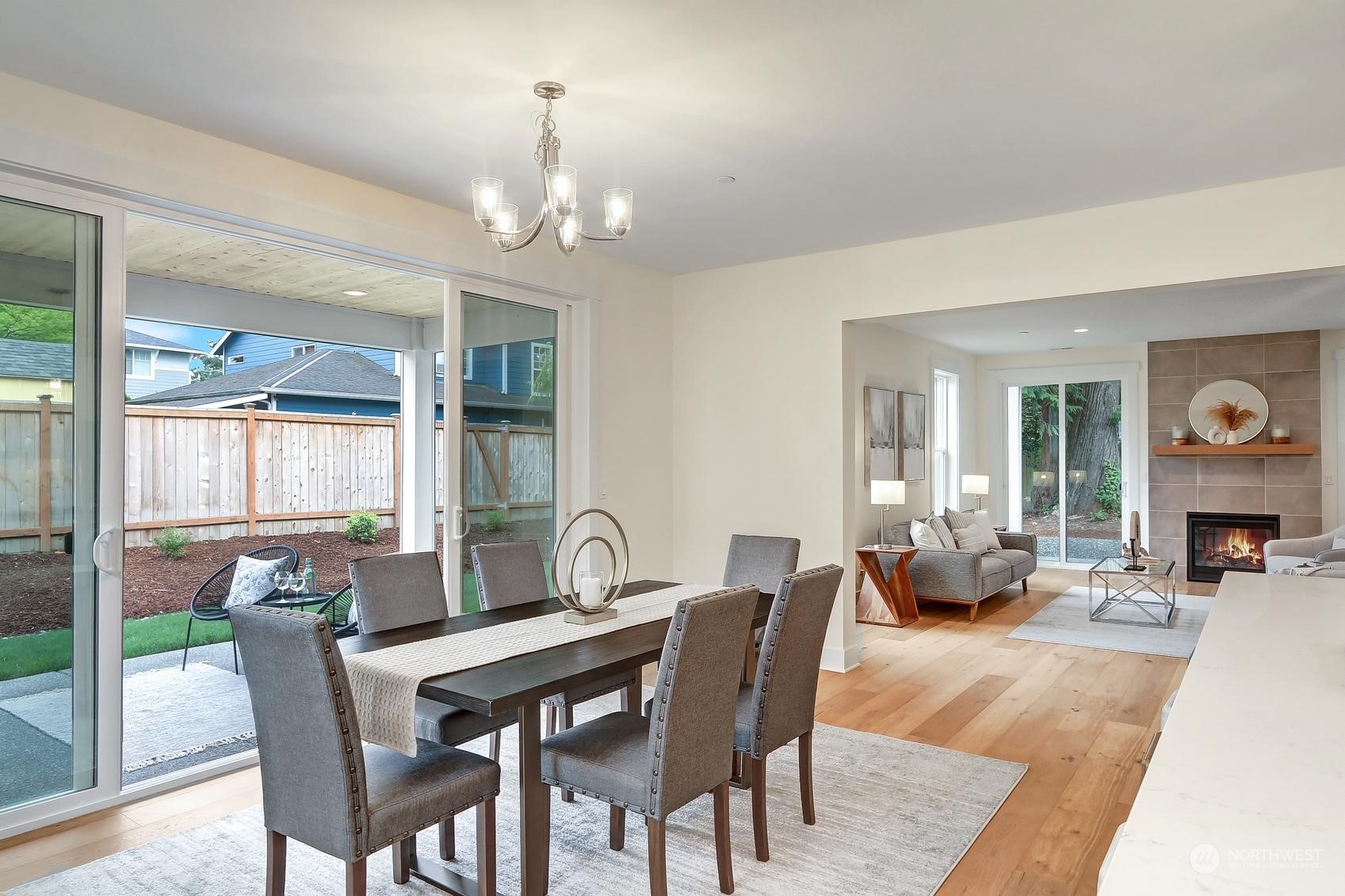 7922 203rd Street Southwest Edmonds, WA 98026 - Photo 7 of 33 a view of a dining room with furniture window and wooden floor