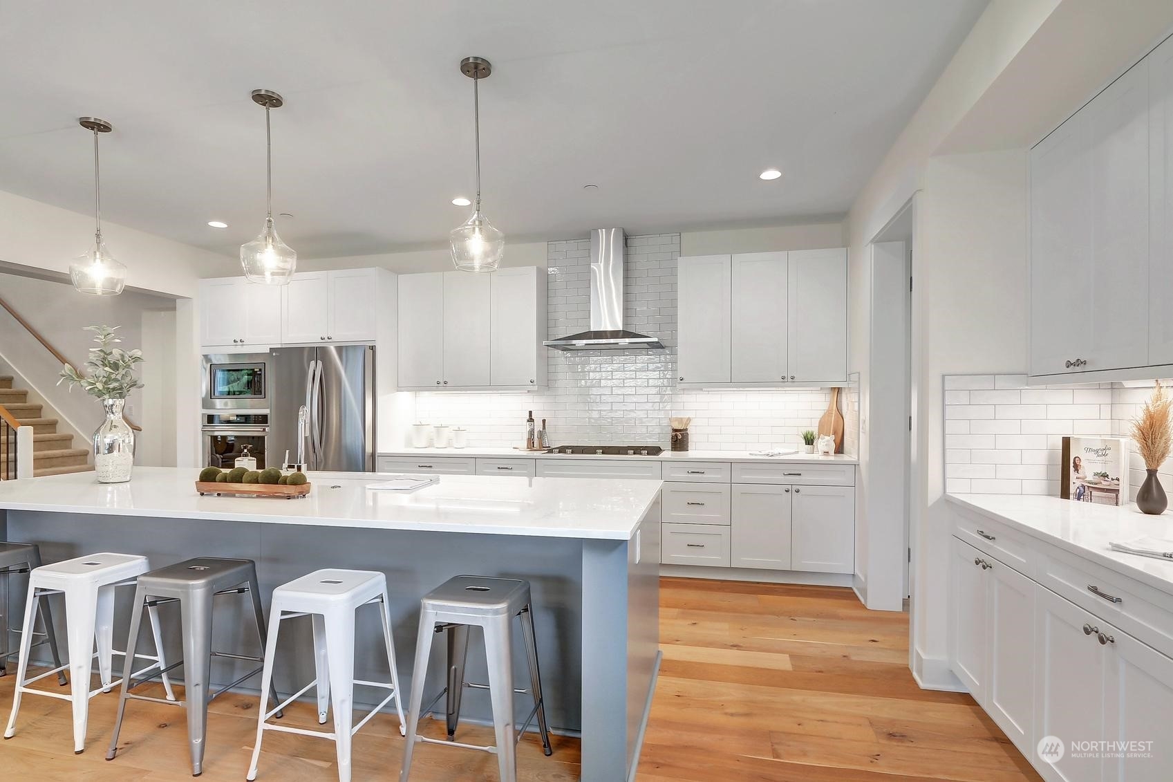 7922 203rd Street Southwest Edmonds, WA 98026 - Photo 9 of 33 a kitchen with a sink window and stainless steel appliances