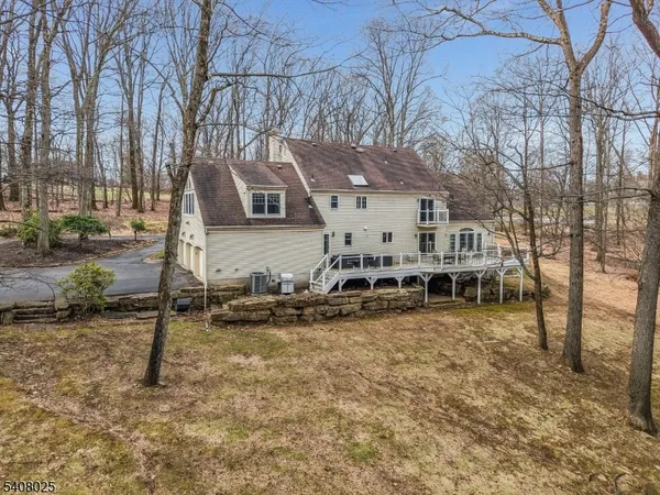a house view with a backyard space