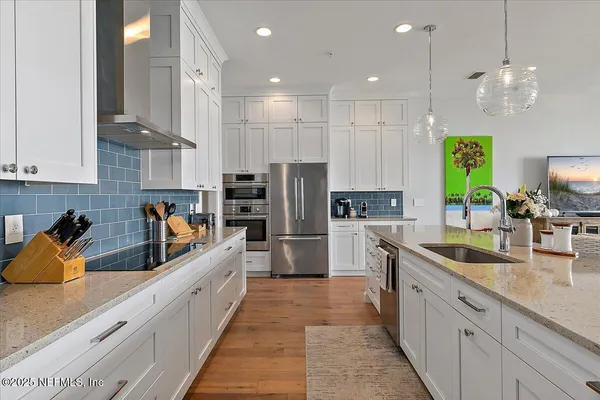 a large kitchen with cabinets