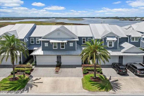 a house with a swimming pool in front of it