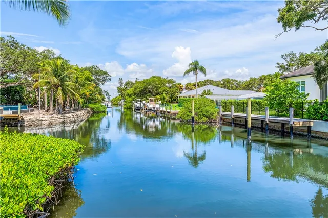 a view of a lake with a building in the background