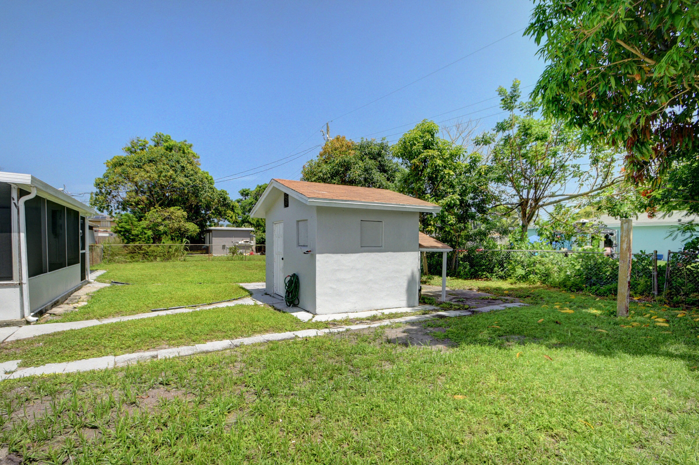 1064 Wilkinson Road Lantana, FL 33462 - Photo 24 of 36 rear 2