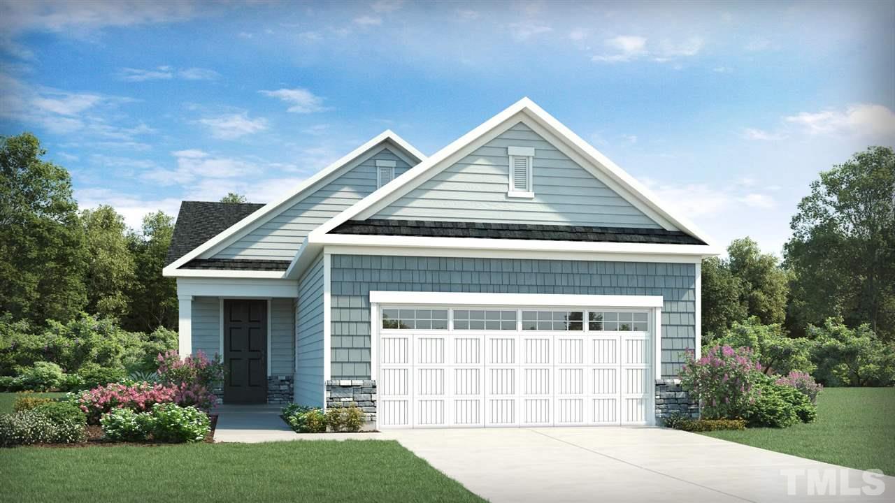 137 Maroon Court, Unit 311 Raleigh, NC 27610 - Photo 1 of 1 front view of a house with a yard