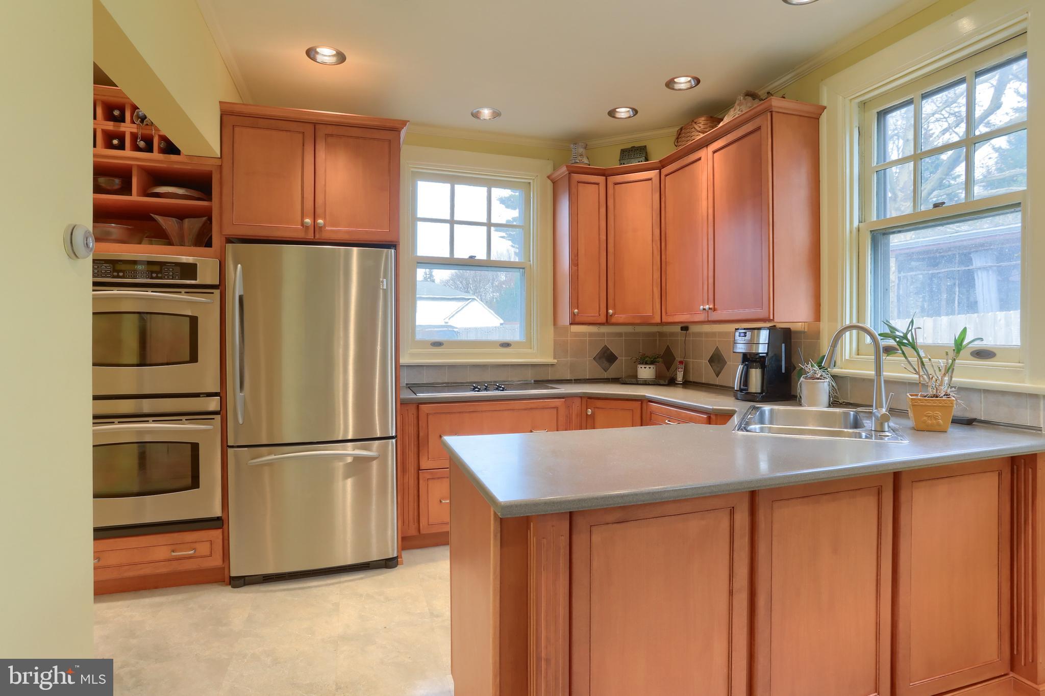 3 East High Street Lebanon, PA 17042 - Photo 12 of 54 a kitchen with stainless steel appliances granite countertop a refrigerator and a sink