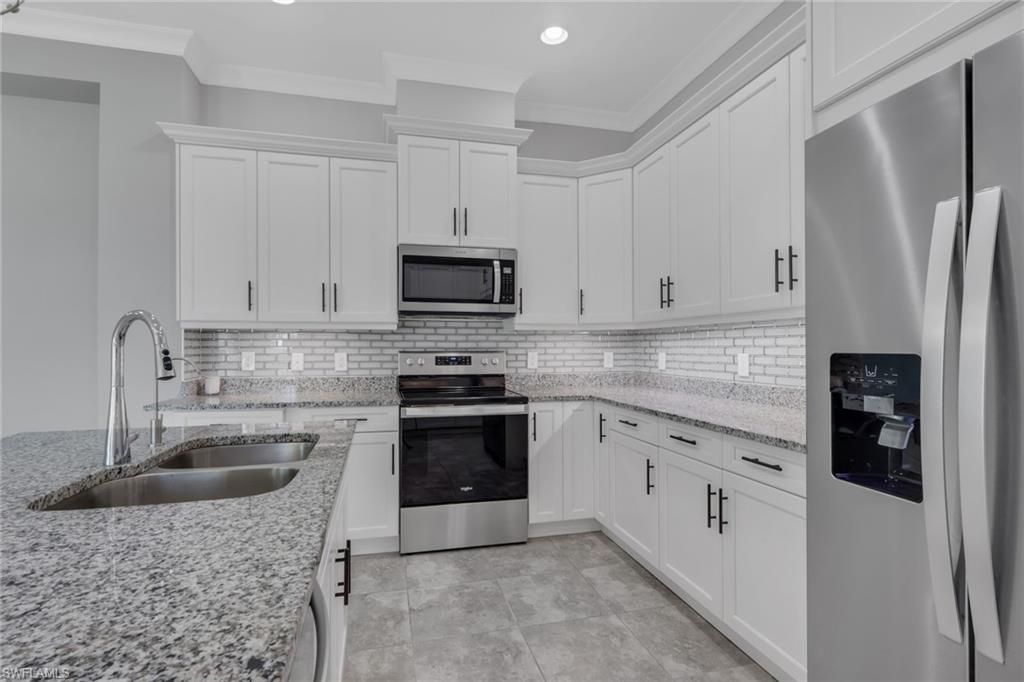 6933 Saona Court Naples, FL 34113 - Photo 11 of 44