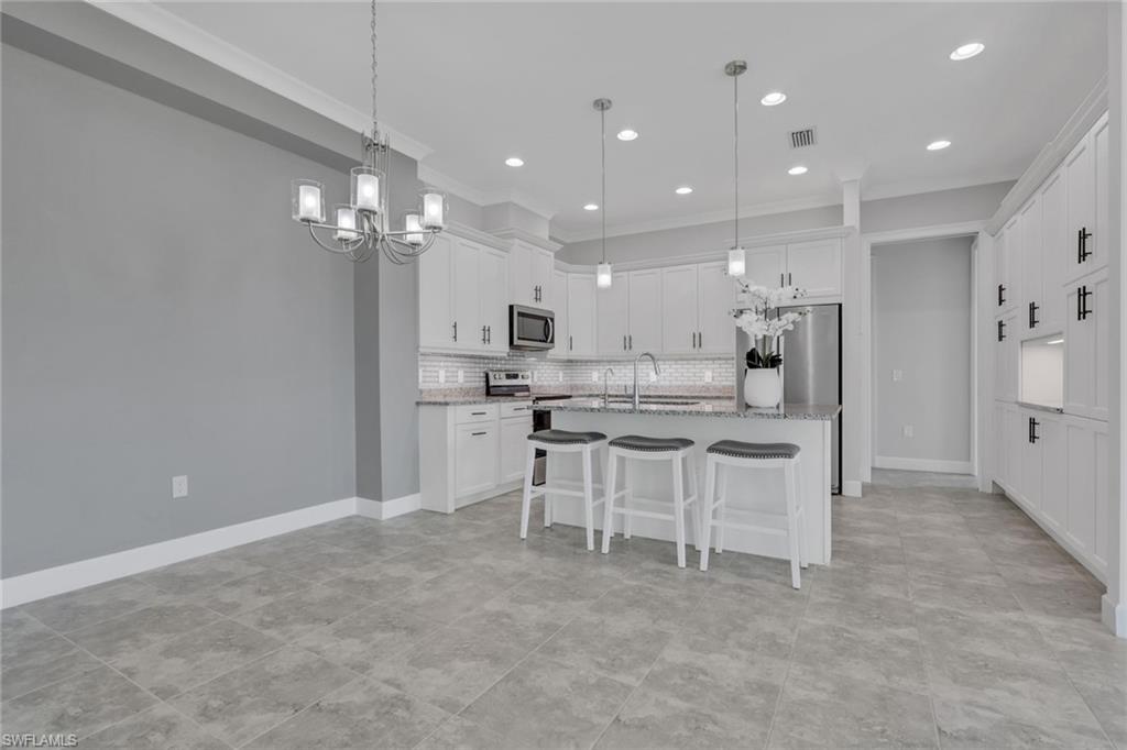 6933 Saona Court Naples, FL 34113 - Photo 15 of 44