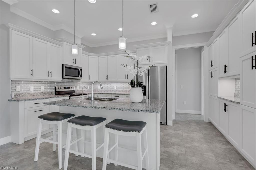 6933 Saona Court Naples, FL 34113 - Photo 10 of 44
