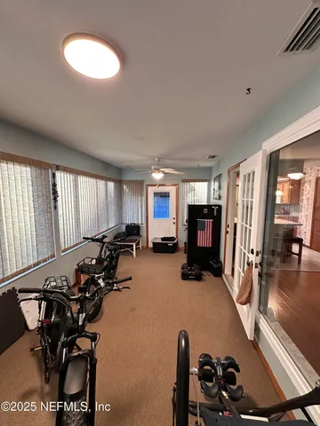 a view of a room with gym equipment