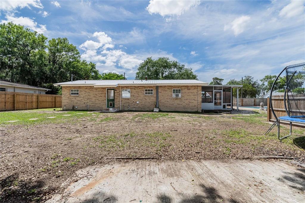 218 North Maple Lane Fort Meade, FL 33841 - Photo 26 of 37 a view of a house with a backyard