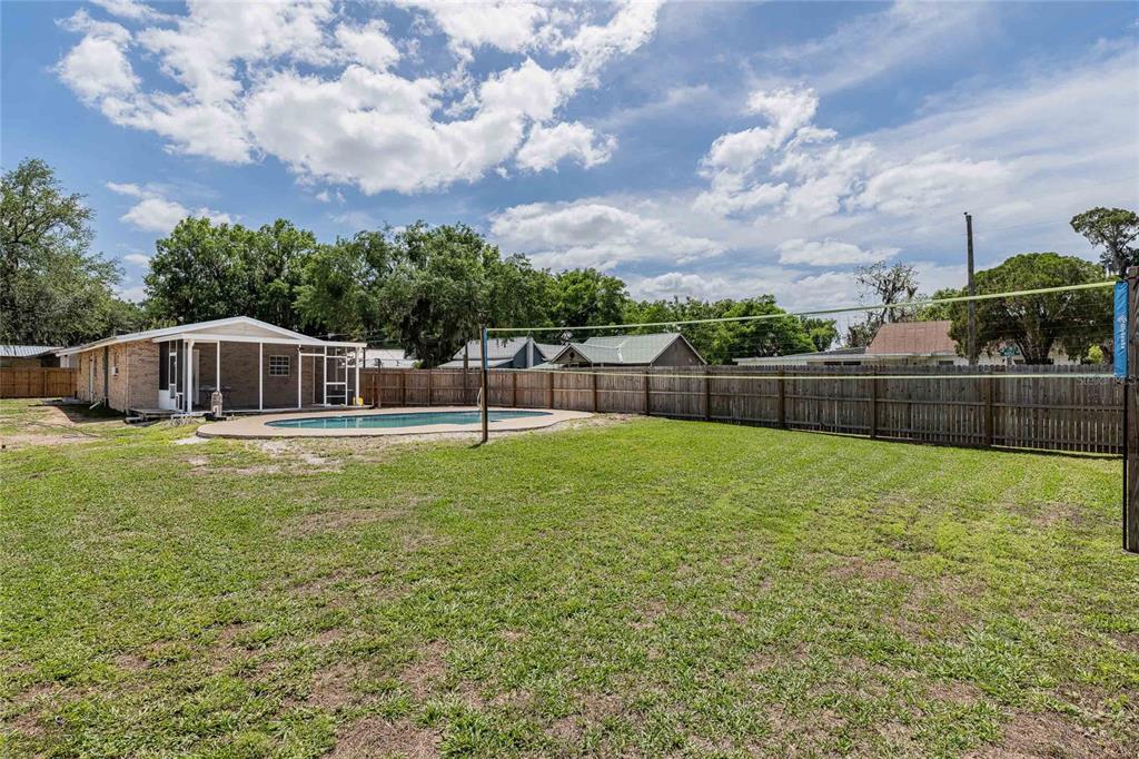 218 North Maple Lane Fort Meade, FL 33841 - Photo 28 of 37 a house view with swimming pool and garden
