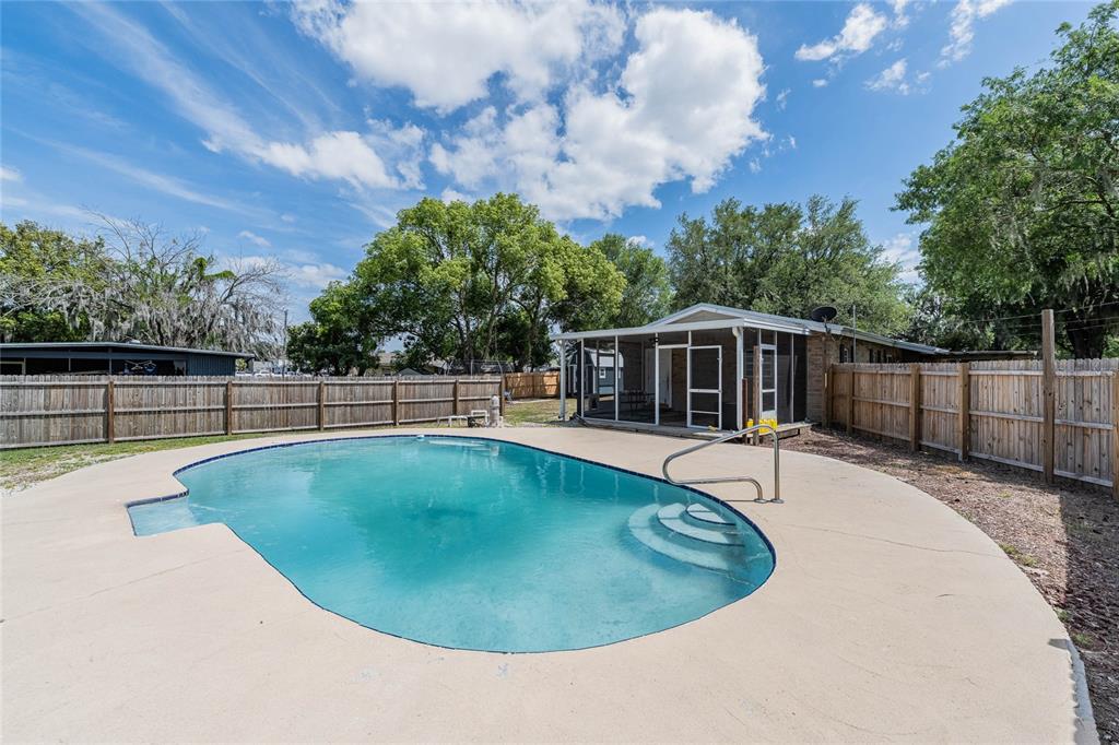 218 North Maple Lane Fort Meade, FL 33841 - Photo 30 of 37 a view of outdoor space and swimming pool