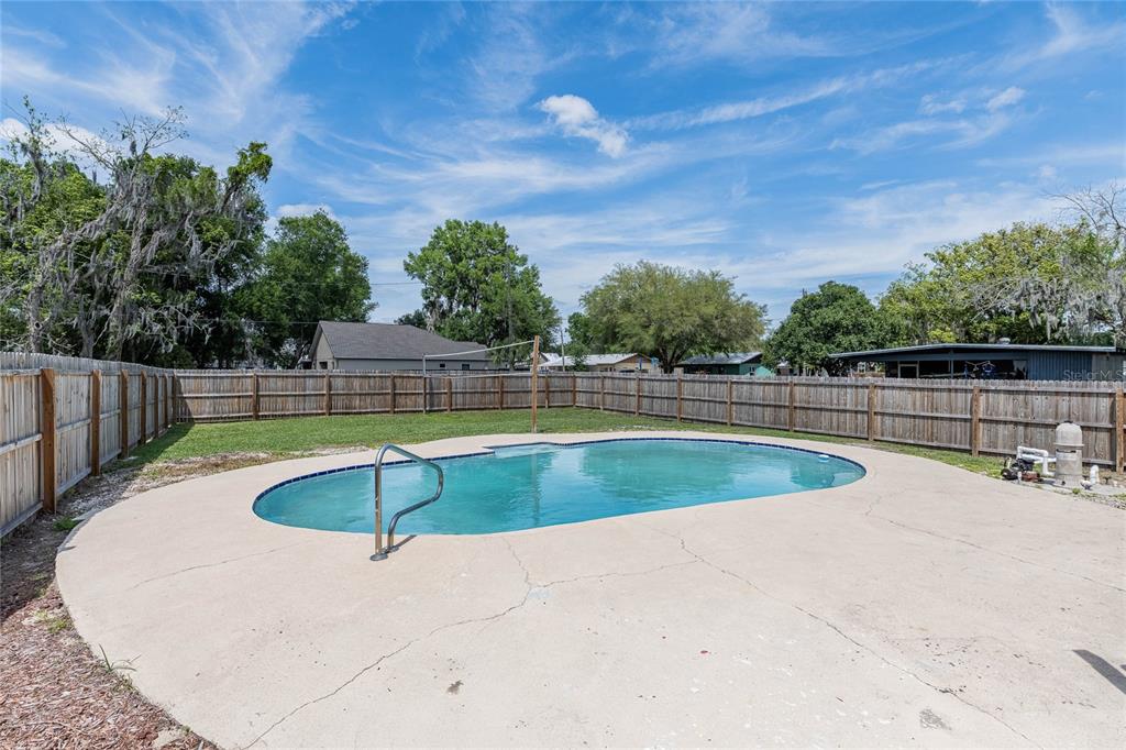 218 North Maple Lane Fort Meade, FL 33841 - Photo 31 of 37 a view of a swimming pool with an outdoor space