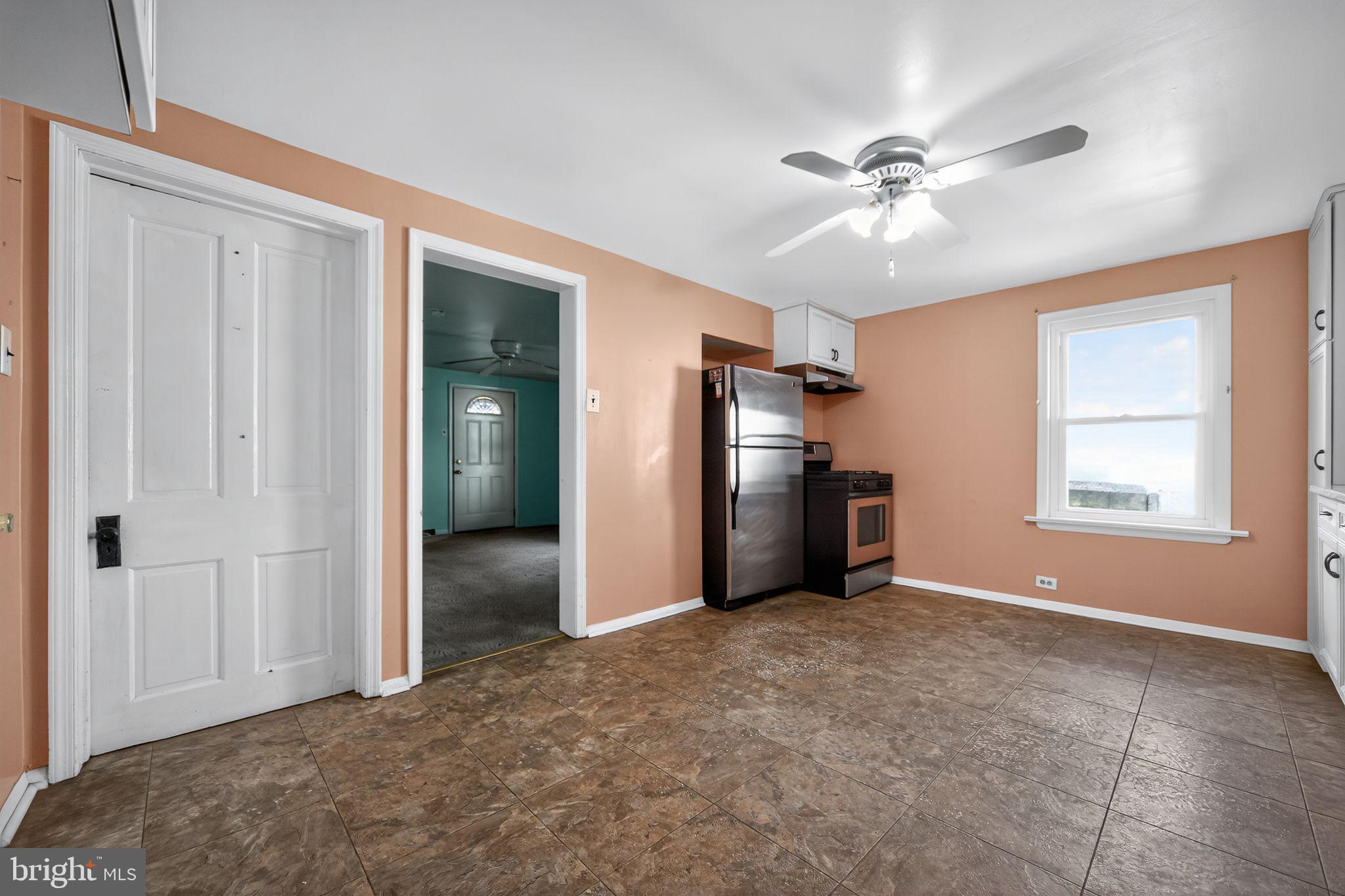 1196 Rebel Hill Road Conshohocken, PA 19428 - Photo 13 of 28 a view of empty room with window and ceiling fan