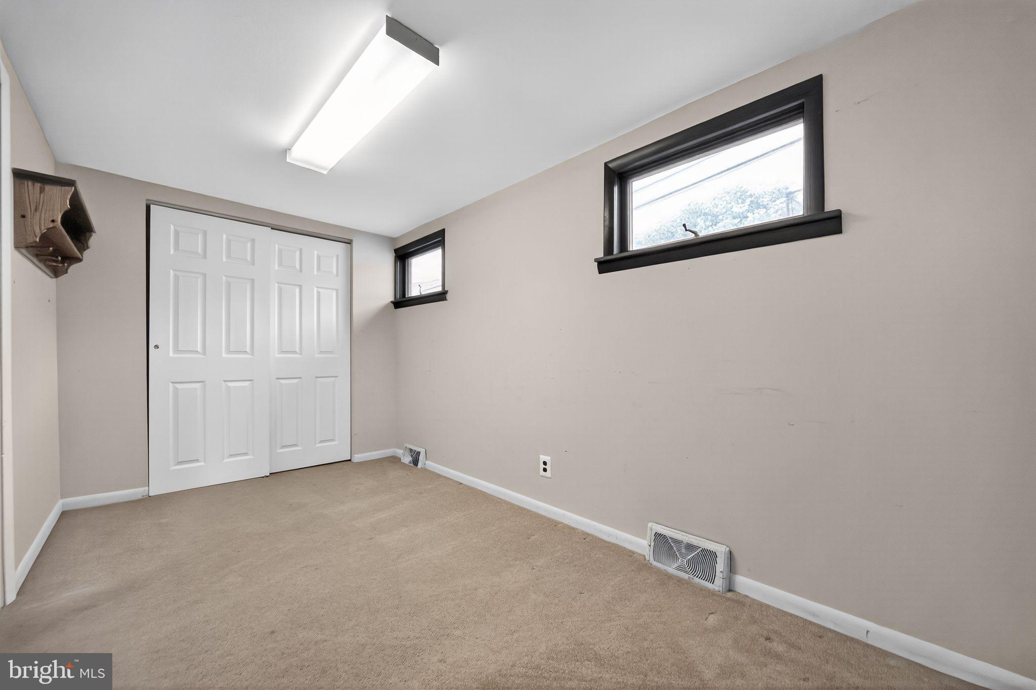 1196 Rebel Hill Road Conshohocken, PA 19428 - Photo 17 of 28 an empty room with windows