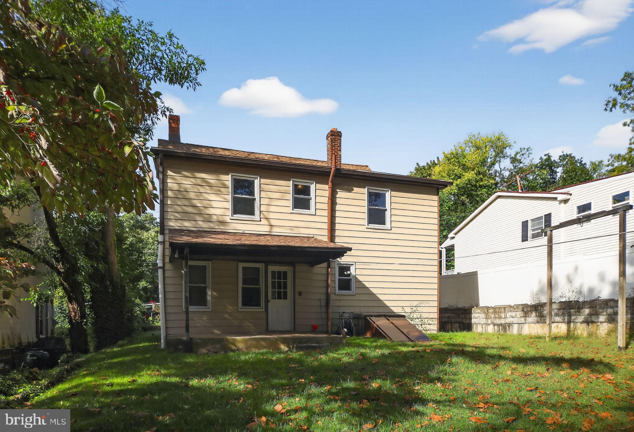 1196 Rebel Hill Road Conshohocken, PA 19428 - Photo 2 of 28 a front view of a house with a yard