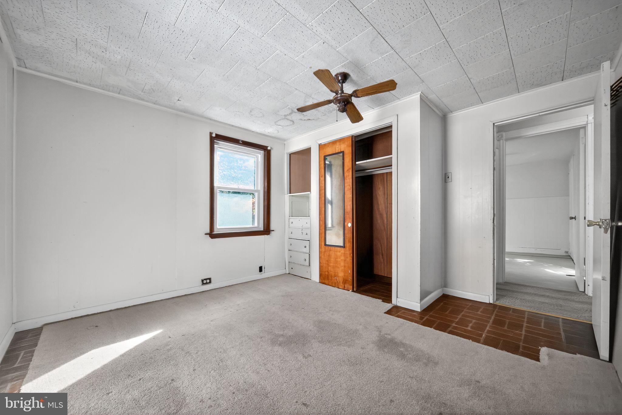 1196 Rebel Hill Road Conshohocken, PA 19428 - Photo 22 of 28 a view of empty room with window and ceiling fan