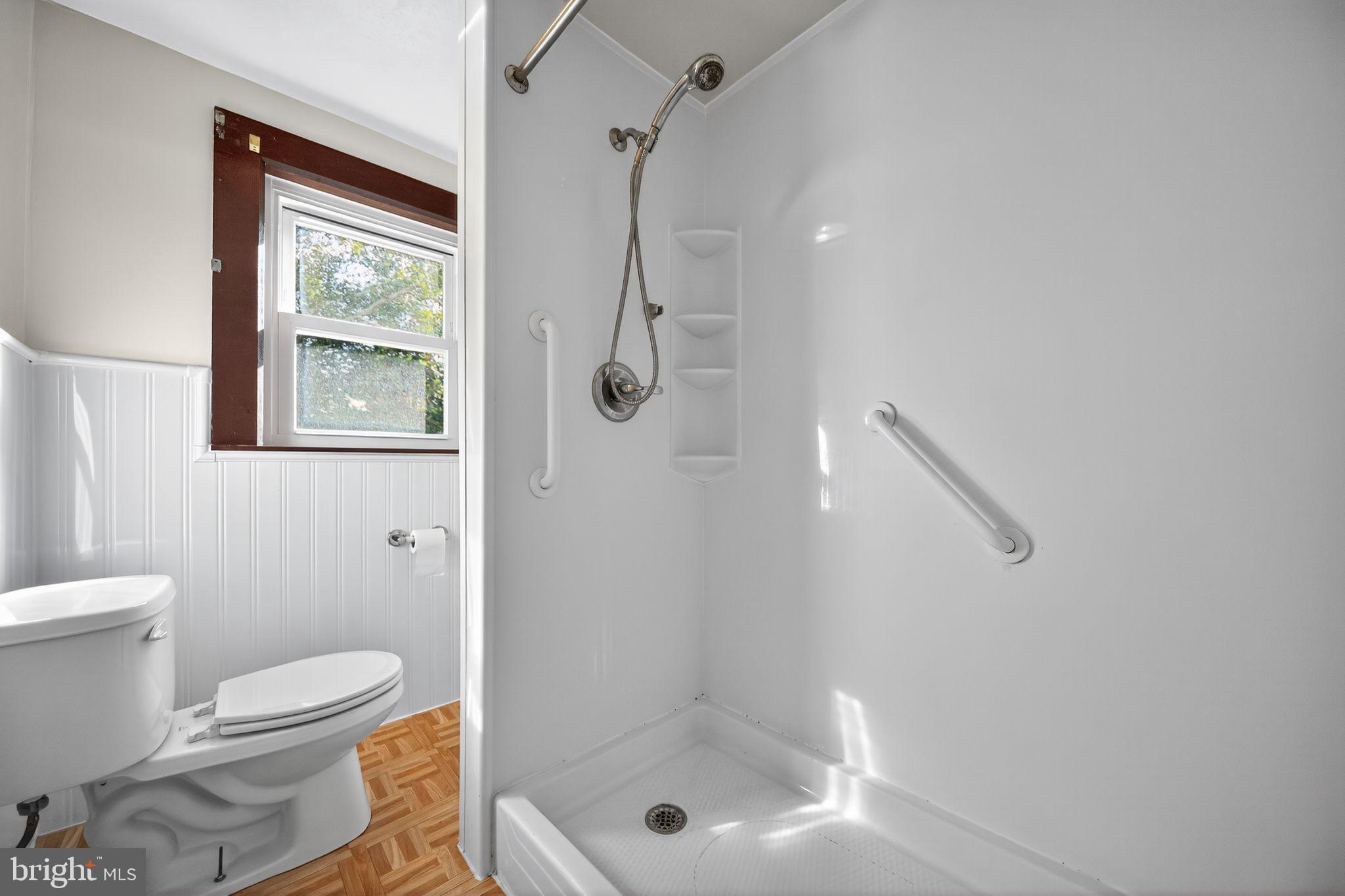 1196 Rebel Hill Road Conshohocken, PA 19428 - Photo 24 of 28 a bathroom with a shower a toilet and a shower