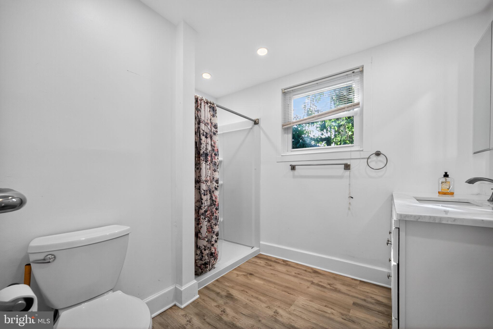 1196 Rebel Hill Road Conshohocken, PA 19428 - Photo 25 of 28 a bathroom with a toilet and a shower