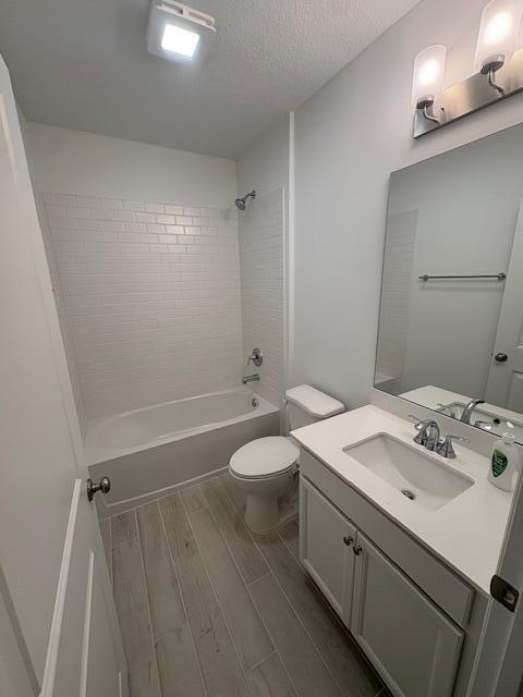 3197 Southwest Savona Boulevard Port St. Lucie, FL 34953 - Photo 20 of 34 a bathroom with a sink a toilet and shower