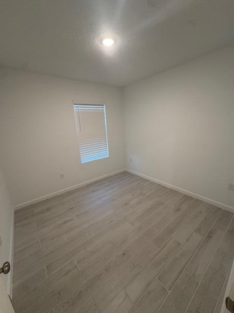 3197 Southwest Savona Boulevard Port St. Lucie, FL 34953 - Photo 22 of 34 an empty room with a window