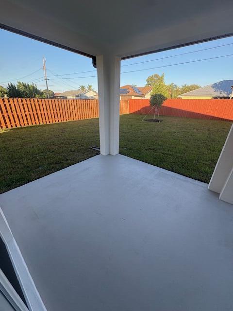 3197 Southwest Savona Boulevard Port St. Lucie, FL 34953 - Photo 30 of 34 a view of a back yard