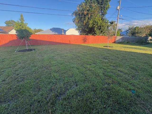 3197 Southwest Savona Boulevard Port St. Lucie, FL 34953 - Photo 31 of 34 a view of a backyard