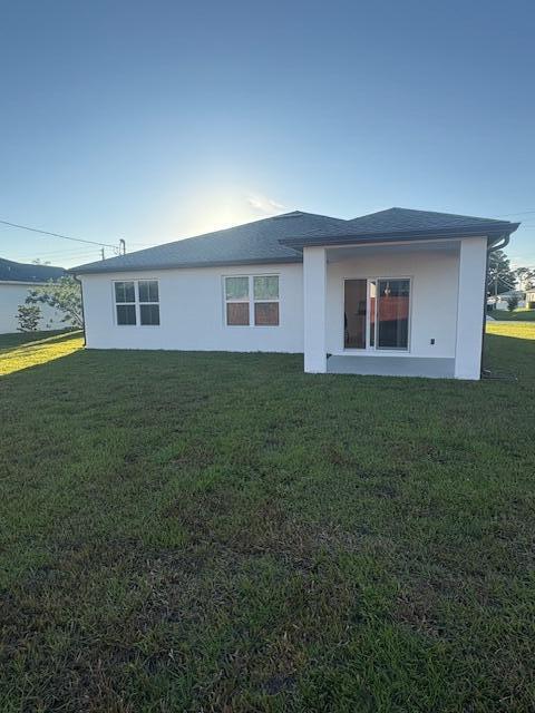 3197 Southwest Savona Boulevard Port St. Lucie, FL 34953 - Photo 33 of 34 a house view with a outdoor space