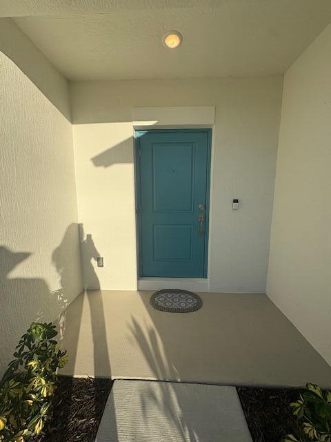 3197 Southwest Savona Boulevard Port St. Lucie, FL 34953 - Photo 4 of 34 a view of entryway