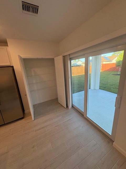 3197 Southwest Savona Boulevard Port St. Lucie, FL 34953 - Photo 10 of 34 an empty room with windows