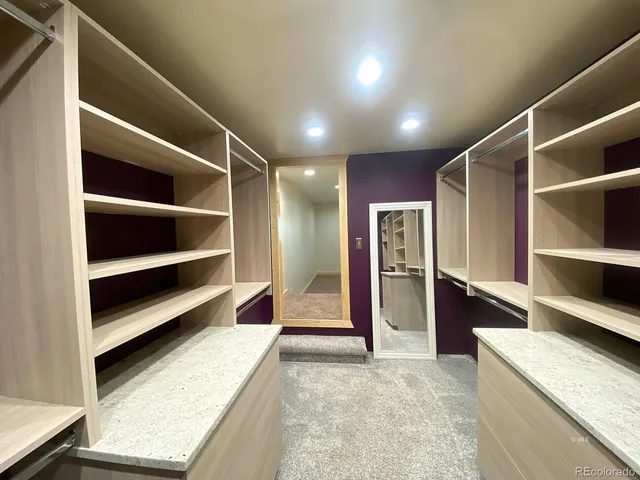 an empty room with a empty space and window